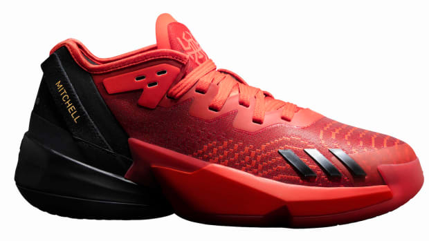 View of red and black Adidas DON Issue 4 shoes.